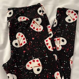 LuLaRoe Black Leggings with White & Red Heart Arrow Print